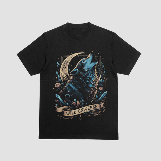 A black short-sleeve crewneck t-shirt featuring a detailed graphic print of a howling blue wolf under a crescent moon with the text 'WILD UNIVERSE' on a banner, displayed against a light gray background.