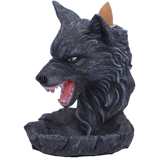 Statue backflow of a wolf head with an open mouth on a white background.