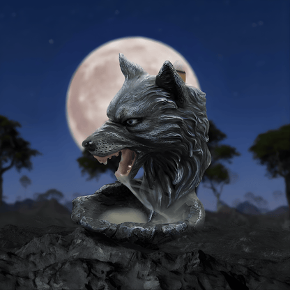 resin mold of a wolf head with a full moon and trees in the background
