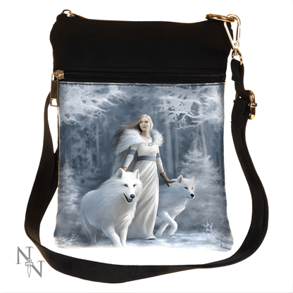 Shoulder bag with a design of a woman in a white dress walking with two white wolves in a snowy forest.