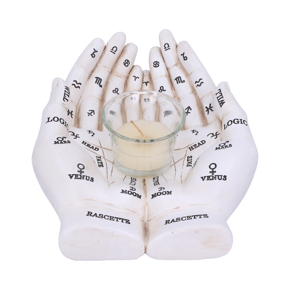 White palm-shaped holder with astrological symbols containing a candle on a white background